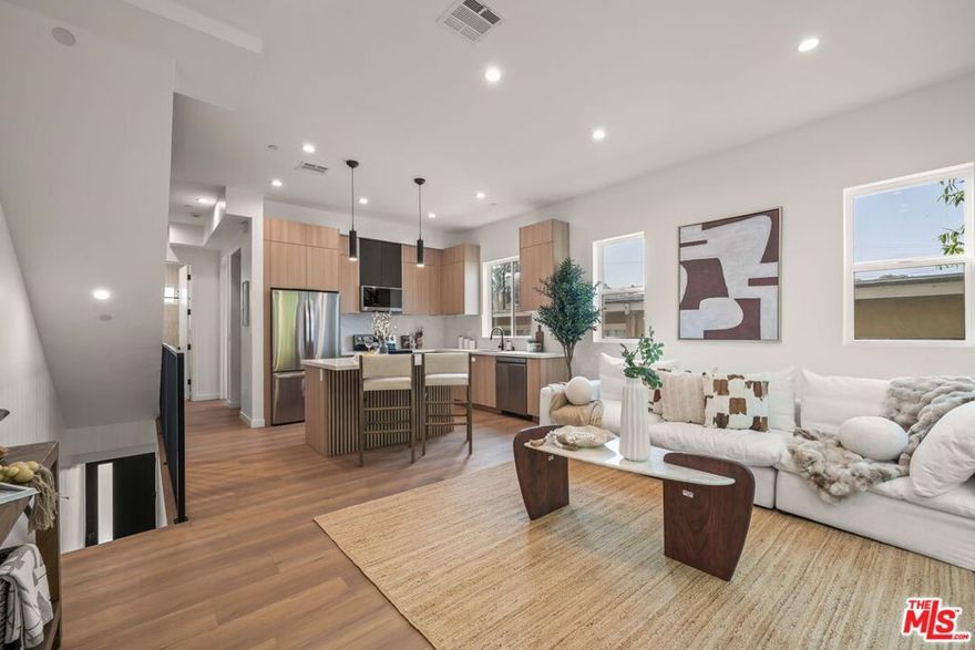 Welcome to The Park View Lofts  your contemporary Westlake oasis. This brand-new residence offers the unit 257 1/2 made of 4 spacious bedrooms and 4 modern bathrooms on three level floor, thoughtfully designed with comfort and style in mind. The open-concept living area flows seamlessly into a gourmet kitchen featuring a large kitchen island with elegant stone waterfall, fully equipped with a premium stove, dishwasher, refrigerator, and microwave perfect for everyday living. Large sliding windows bathe the home in natural light opening onto private balcony, while modern finishes create a clean, sophisticated atmosphere. Step outside the primary bedroom to your private balcony, natural backdrop. The top floor opens to a private rooftop deck offering City views, built-in lights and water outlet. With its stylish design, abundant light, and peaceful outdoor retreat, this home is more than a place to live it's a lifestyle you'll love. The unit comes with 2 side-by-side parking spaces. ***FIRST MONTH RENT FOR FREE*** , monthly base rent is $5,700 per month. Displayed rent at $5,200 is the amortized rent including the free month rent.