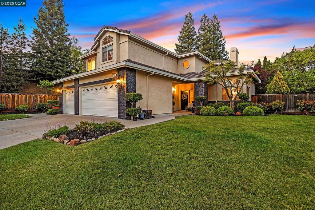 Open house this Sat/Sun from 1-4pm! Tucked at the end of a peaceful cul-de-sac in Danville’s coveted GATED community of Bettencourt Ranch, this beautifully updated home blends stylish design with easy, everyday comfort. The open, light-filled floor plan features soaring ceilings, hardwood floors, and elegant modern touches throughout. The updated kitchen is a true standout with marble countertops, a gas range, stainless appliances, pantry, and a custom coffee bar. The main level includes a full bedroom and bath—perfect for guests or a home office. Upstairs, the spacious primary suite overlooks the lush backyard and includes a spa-inspired bath and large walk-in closet. Outside, the private yard is designed for low-maintenance enjoyment with garden beds, fruit trees, lawn area and a generous patio—ideal for outdoor dining or weekend relaxing. Just steps from greenbelt trails and moments from the community’s main gate, this home offers both privacy and convenience. Enjoy access to resort-style HOA amenities including a pool, clubhouse, tennis and pickleball courts, playground, and more. With top-rated schools, parks, Blackhawk Plaza, and hiking trails all nearby—this is Danville living at its best.