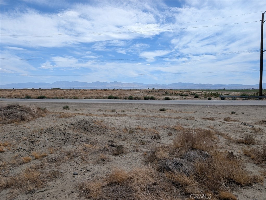 Make time to see this large, level piece of land with valuable A2 zoning, power in the street and frontage on Avenue J. Buyer to verify zoning, environmental and hazard zones, availability and cost of utilities.
