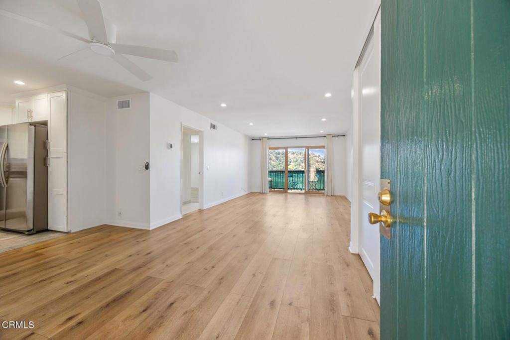 Back on market at NO fault of the property. This sweet top floor end unit condo is exactly what you've been looking for! As you enter, the spacious living room will impress and then you'll notice the sliding door access from the living room to the balcony with windows allowing in wonderful light and a view of downtown! The balcony offers a view of the city or the verdant hills, depending on your mood. This place is wonderfully remodeled with a bright kitchen, newer appliances and an almost brand new washer/dryer (all in one) unit. The bathroom was also recently updated and has fantastic lighting and a separate vanity area. A larger bedroom offers a very spacious closet with built-ins and also has a wonderful view. Don't miss the built-ins in the front closet! Close hiking trails, Montrose and La Canada yet nestled in the peacefullness of the hills, you will love this sweet place.