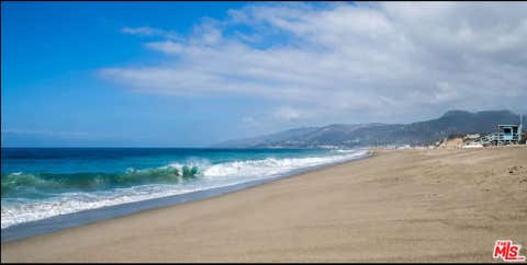 Photo of 29910 Cuthbert Road, Malibu, CA 90265 (MLS # 26838455)