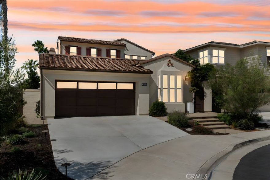 Experience coastal luxury and modern sophistication in this stunning St. Augustine I residence, ideally located on a peaceful cul-de-sac. Designed for convenience and elegance, the home lives like a single story with a spacious main-floor primary retreat and offers 4 bedrooms, 3 full bathrooms, and approximately 2,457 square feet of beautifully upgraded living space. Every inch has been thoughtfully upgraded, featuring all-new finishes and designer-selected flooring coordinated by a professional interior designer. Expansive folding accordion doors with retractable screens throughout open the home entirely to the outdoors, welcoming cool ocean breezes and creating seamless indoor/outdoor living. The chef-inspired kitchen is a true showpiece with upgraded cabinetry, waterfall-edge countertops, a walk-in pantry and professional-grade appliances—including a built-in glass door refrigerator, oven, microwave, range, range hood, dishwasher, warming drawer and beverage refrigerator drawers. A custom built-in storage and entertainment unit enhances the dining area, while an open dual sided peninsula-style fireplace adds warmth and architectural charm. All bathrooms have been fully remodeled with new fixtures and lighted mirrors, and each bedroom features multi-speed, ultra-quiet ceiling fans. Additional upgrades include new electrical and LED lighting throughout, Low-E windows with no-grid glazing, and elegant Shade Store curtains and blinds that complete the refined interior. The backyard is an entertainer’s dream, highlighted by a California room with fireplace, retractable wind/sun screens, and LED lighting throughout. Enjoy panoramic ocean views from the top level, or gather in the outdoor kitchen featuring a built-in BBQ, high-BTU burner, and sink, surrounded by professionally designed drought-tolerant landscaping with low-maintenance plantings and landscape lighting in both front and back. Additional highlights include an epoxy coated garage floor with storage systems, 240V outlet for EV charging, attic storage, and a new multi-zone air conditioning system installed last year to meet the latest efficiency standards. Perfectly situated just moments from the beach, The Huntington Club, Downtown Huntington Beach, top-rated schools, and premier shopping and dining, this exceptional home defines the best of modern coastal living.