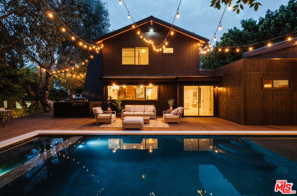 A rare gem in Studio City, this modern A-frame masterpiece offers contemporary luxury with a unique layout designed for seamless indoor-outdoor living. Featuring brand-new interiors, multiple outdoor entertaining spaces, and a private pool and fire pit, this home provides the perfect blend of style and comfort.The main house boasts four spacious bedrooms and 3.5 bathrooms, while an attached guest house with its own entrance, full bath, and dedicated parking offers incredible versatility as a fifth bedroom, office, gym, or recording studio. Available for short-term or long-term stays. Price for fully furnished with utilities is $25,500. Property available starting Sept. 1.