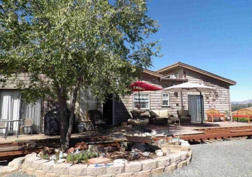 First time on the market in 30 years! Privacy abounds at your 360 degree view property on over 7 acres with plenty to enjoy. Relax on the deck overlooking the lake with Mt Konocti down the valley. This unique home has so much potential to create space for all of your kids, crafting ideas, or storage. Garage comes with 250v and multiple separate rooms in the basement to store your wine or collectibles. RV and boat parking galore along with your own mini olive orchard. Bring your dreams to turn this private fixer into your own oasis.