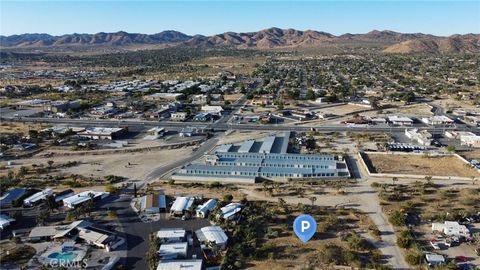 Photo of 771 Scarvan Road, Yucca Valley, CA 92284 (MLS # HD26045961)