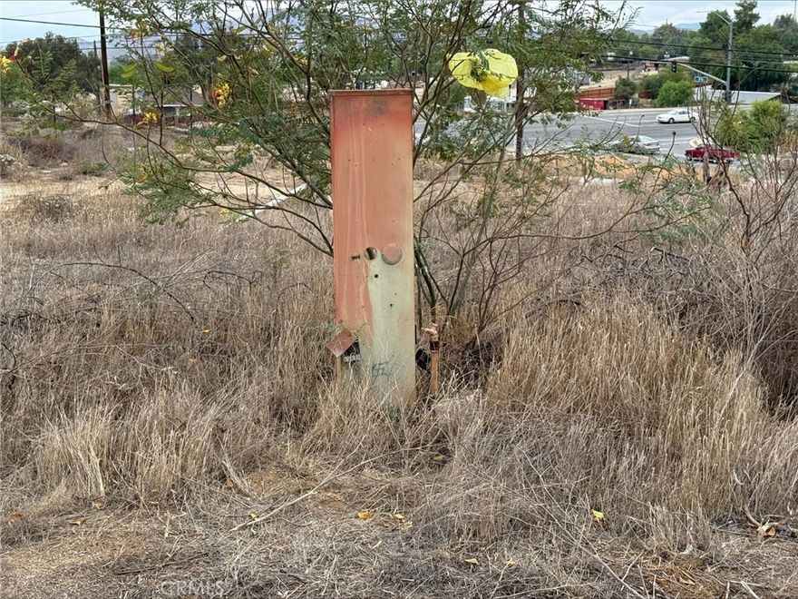 .97 Acres with over 400' of frontage road on HWY 74. There is a street light on this corner. Traffic has thousands of cars drive past every day.

The lot next to this is also for sale, they can be sold together or separate 326-250-032 is .75 acres and is $200,000. 

326-250-042 is the corner and is .97 acres and is $350,000. Buy them both. Seller may finance with min 20% down.

$550,000 If purchased together.