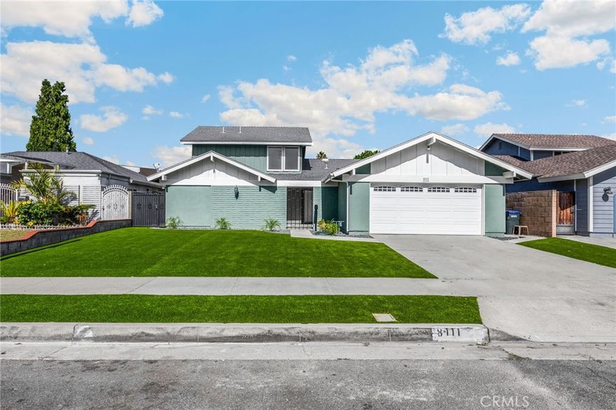 Welcoming Two-Story Home with Private Courtyard & 2 Suites. This inviting home offers great curb appeal with a gated front courtyard and newly installed turf. Fresh interior paint, thoughtful updates, and a clean, move-in-ready presentation make it standout. Interior Highlights include: Entry features a retro touch with marble tile flooring and gold swirl wall mirrors, leading into luxury vinyl plank flooring throughout the first level. Functional floorplan with bedrooms on one side and living/kitchen spaces on the other. First floor includes a primary suite with private bath, two additional bedrooms, and a hall bathroom. Upstairs offers a versatile mini studio or second primary suite with remodeled bathroom—ideal for guests, multi-generational living, or a private retreat. Updated kitchen with quartz countertops, white cabinetry, stainless steel appliances, and casual dining area. Living room features a fireplace, ceiling fan, and sliding glass door to the backyard. Outdoor & Additional Features: Inviting backyard with covered patio and newly installed turf. Two-car garage with updated lighting, laundry area, and direct access to kitchen and side yard. Location: Nestled in a quiet Stanton neighborhood and surrounded by Midway City, Westminster, Anaheim, and Garden Grove, this home is close to shopping, entertainment, and dining. Easy access to the 22 and 405 freeways, and just miles from the beach via Beach Blvd.