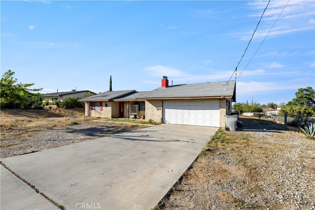 Welcome to this charming 2 bedroom, 1 bathroom home conveniently located on Main Street in Hesperia. Built on a spacious .45-acre lot (almost half an acre), this property offers plenty of room for parking, storage, or future possibilities.
The home includes a covered patio currently being used as an additional room—perfect for a home office, hobby area, or flexible living space.
Just minutes from Hesperia Lake Park, shopping, dining, and commuter routes, this home combines comfort and convenience. Don’t miss the opportunity to own a property with this much land in a prime location!