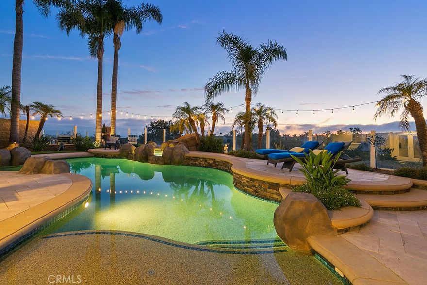 Available January 12th through August 10, 2026! This FURNISHED home offers breathtaking ocean views that will leave you in awe. Nestled in the highly sought-after San Marin community, this home boasts 5 bedrooms, 3 full bathrooms, and endless upgrades throughout! As you step inside, you'll be greeted by beautiful hardwood flooring and high, beamed ceilings, creating a warm and inviting atmosphere. The walls have been removed to create a seamless open concept between the gourmet chef's kitchen, the family room, and the formal dining room. The kitchen is a culinary enthusiast's dream, equipped with high-end stainless appliances, a built-in refrigerator, custom cabinetry, and a spacious working island with exquisite stone countertops. Plus, an additional wine/drink fridge is built into the family room for your entertainment needs. The property offers stunning ocean views from both levels, allowing you to enjoy mesmerizing sunsets and the serene beauty of the sea. Step outside into the resort-like yard, where you'll find an oversized, sparkling pool and spa, perfect for relaxation and enjoyment. Host outdoor gatherings at the built-in BBQ island and bar, gather around the cozy fire pit, or unwind in the quiet sitting area surrounded by landscaping that adds to the tranquility of the space. With 5 bedrooms and 3 remodeled bathrooms, including a lower-level office/guest bedroom with a custom Murphy bed. The upstairs primary bedroom features a king-sized bed, a large balcony with gorgeous ocean views, and a large ensuite with tiled shower, soaking tub, separate water closet, and a large walk-in closet. Two more guest rooms feature queen-sized beds with one bedroom enjoying its very own private balcony. A large third upstairs guest room is a perfect kids room that includes a twin-sized trundle bed, a low-height table, and desk. Located at the end of a quiet cul-de-sac on a single loaded street, this home provides plenty of parking and a peaceful atmosphere. San Marin is conveniently situated approximately a mile away from world-renowned beaches, trolley access, 5-star resorts, and beautiful beach trails. Experience the epitome of private, resort-style living in this furnished home. Your coastal oasis awaits! Rate varies based on length of term and time of year: $12,500 for 3-11 month lease, June, July, and August or less than 3 months are $14,000 per month.