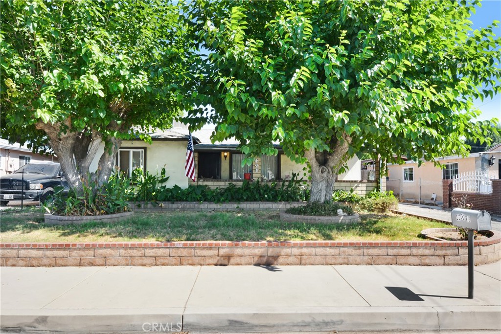 PROBATE - Full Authority. Charming and full of potential, this 3-bedroom, 1-bathroom Rialto home is perfect for new families or anyone looking to downsize without sacrificing comfort. **Large lot with detached garage and shed, along with rear alley entry to the yard, provides a fantastic opportunity for an ADU conversion** Extra bedroom added on making it FOUR bedrooms total. The large front yard features two mature trees that offer plenty of shade, along with a spacious covered porch and a long driveway —ideal for relaxing on warm afternoons. Inside, the home is cozy, inviting, and ready for your personal touches. Conveniently located near downtown Rialto, you'll have easy access to shops, dining, schools, and local parks. Whether you're just starting out or simplifying your lifestyle, this home offers the ideal canvas to make your own. Broker and agents do not represent or guarantee the accuracy of the square footage, income, expenses, condition, development potential, bedroom/ bathroom count, lot size or lot lines, dimensions, permitted or non-permitted spaces, or school eligibility. Buyer is advised to independently verify the accuracy of all information with appropriate professionals. There are no warranties or guarantees, buyer to rely solely on his/her/their own findings.