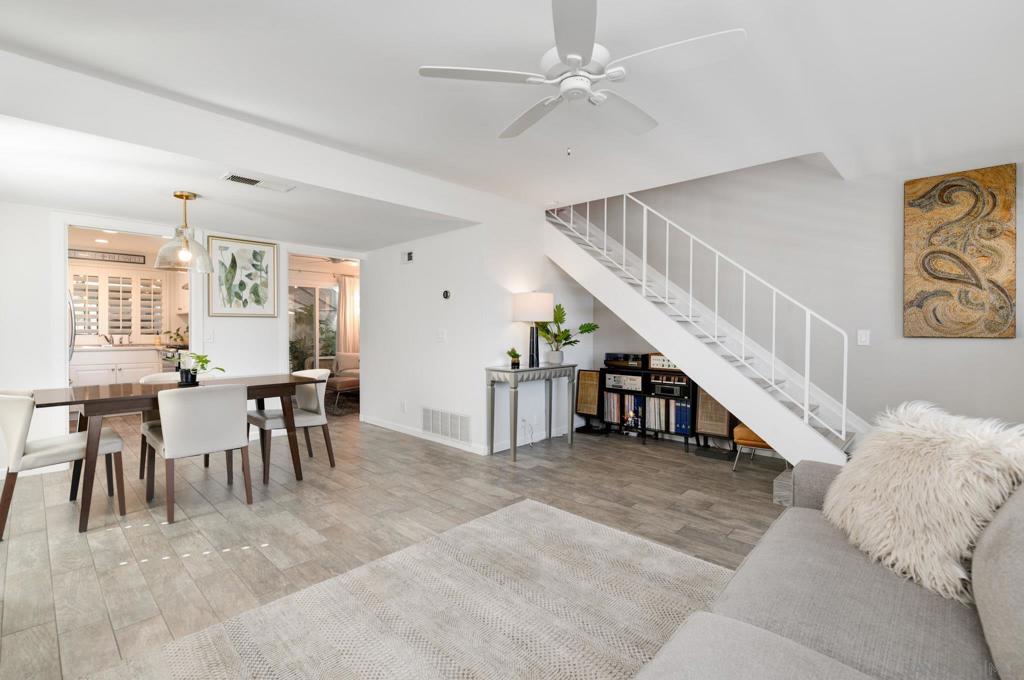 Discover this beautifully updated 2-bedroom, 2-bathroom townhouse perfectly situated at the top of the community. With only one adjoining neighbor, this corner unit offers privacy and tranquility while showcasing panoramic views of the valley and surrounding mountains. Inside, the home features a modern open layout with thoughtful updates throughout, creating light-filled living spaces designed for both style and functionality. Step outside to a fully private, semi-enclosed patio, ideal for relaxing or entertaining, with direct access to a spacious 2-car garage. Additional highlights include central air conditioning and heating for year-round comfort. This home combines comfort, convenience, and incredible scenery. This is an opportunity you won’t want to miss!