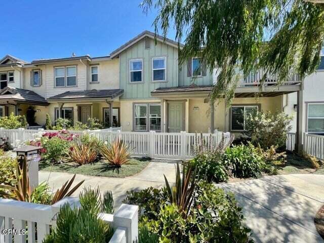This beautiful townhouse is situated in the gated community of the Hideaways, just steps away from Port Hueneme Beach and Pier. The home features three bedrooms and two and a half baths, with engineered wood flooring on the lower level, a cozy fireplace, granite countertops, and stainless steel appliances in the kitchen. A laundry room, which includes a washer and dryer, is conveniently located downstairs. All bedrooms are located upstairs and have carpet flooring. Community amenities include an outdoor pool and spa. The townhouse has an attached two-car garage and a front patio that's perfect for hanging out and barbecuing. Please note that no pets are allowed.