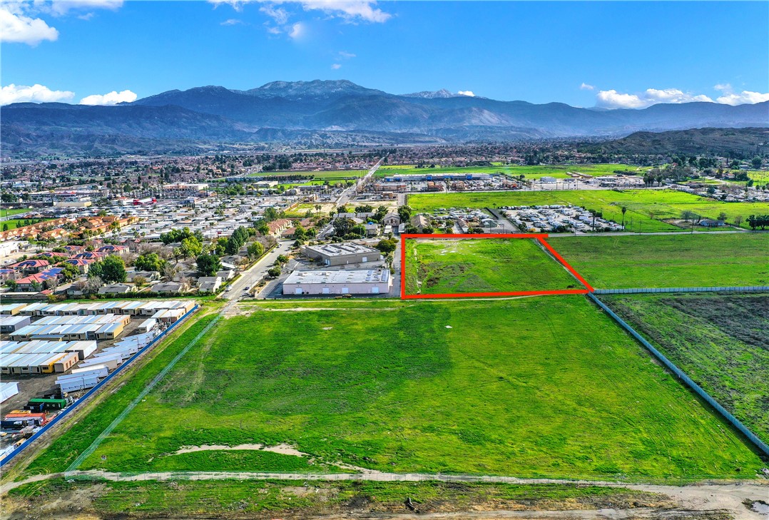 TWO CONTIGUOUS PARCELS – Available Together or Separately
Offering a total of approximately 13.63 acres of industrial-zoned land, this listing(Parcel 1) is one of two contiguous parcels that may be purchased either separately or as a package.
Parcel 1: ±4.56 acres, zoned C-M (Commercial Manufacturing) – Ideal for light manufacturing, display and sales of modular homes, warehousing and distribution uses, business offices, fabrication, assembly, service repairs (for single-tenant operations), and machine shops with no outdoor operations.
Parcel 2: ±9.08 acres, (listing OC25164407) zoned M-2 (Heavy Industrial) – Well-suited for outdoor storage, parking or storage of vehicles and equipment, RV storage, contractor yards, and equipment rental.
Both parcels share a General Plan Land Use Designation of Industrial, and benefit from their location in the growing southwest commercial area of Hemet, near major retailers including Wal-Mart Supercenter, Home Depot, and Lowe’s, as well as the Amazon Fulfillment Center.
The property is situated on the west side of Santa Fe Street, just south of Oakwood Street, with all utilities available at the street.
Buyers and/or their agents are responsible for verifying zoning, parcel sizes, utilities, permitted uses, and any development requirements.