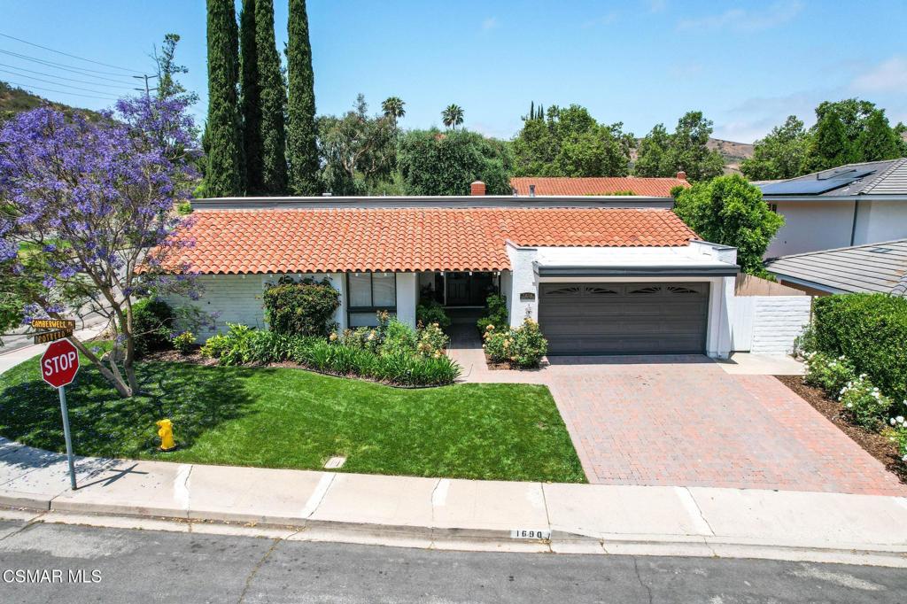 This updated Hacienda Style home shows even more beautifully in person. Now thoughtfully priced to sell. Located in the desirable Foxmoor Neighborhood in Westlake Village, this stunning four-bedroom, two-bathroom home offers a carefully designed floor plan that truly makes sense. With seamless flow between the living room, family room, and kitchen--all opening through French doors to a private backyard--this home is perfect for both relaxed living and effortless entertaining. Step outside to your own backyard retreat, where a recently refinished sparkling pool and brand-new heater provide year-round enjoyment. Inside, the home is bright and airy, featuring vaulted ceilings, custom moldings, recessed lighting, and stylish updates throughout. Enjoy new flooring, cabinetry, doors, ceiling fans, and central air conditioning for year-round comfort and ease. The private primary suite provides a tranquil escape, while three additional generously sized bedrooms offer flexibility for family or guests. The updated kitchen and bathrooms boast sleek finishes and modern fixtures, including a new Fisher & Paykel two-drawer dishwasher and a new gas oven--perfect for home chefs. A newly installed garage organization system adds extra functionality and storage. Every inch of this exceptional Foxmoor home reflects thoughtful updates designed for both style and everyday comfort. Ideally situated just moments from an award-winning elementary school, scenic parks, upscale shopping, and dining options in the heart of Westlake Village. Truly, a home that has it all.
