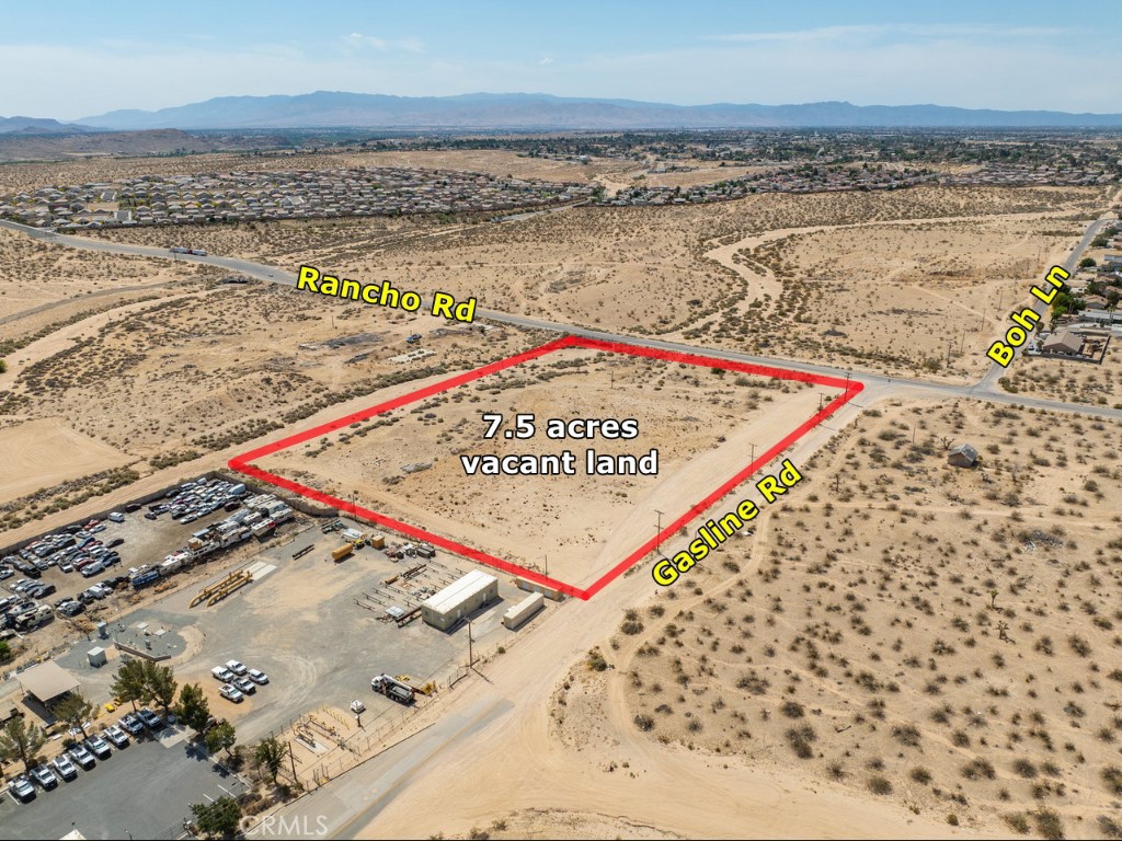 ***C1 & C2 Zoning***Large lot at the NE corner of paved Rancho Road and Gasline Road. Two acres in the corner are zoned C1 (Neighborhood Service Commercial) and the rest is zoned C2 (General Commercial) which allow a wide range of uses. Power lines run along Gasline Road and the other utilities are nearby. This lot is only a few minutes away from Southern California Logistics Airport and also in close proximity to the planned High Desert Corridor. Once the Bright Line West high-speed train is in operation in a few years, it will give a huge boost to the local economy in Victorville. Do not miss this opportunity to make your dream come true on this blank canvas. Please note that the boundaries represented in the photos are only an estimation. Buyers should verify, ensuring every aspect aligns with their vision for the property.