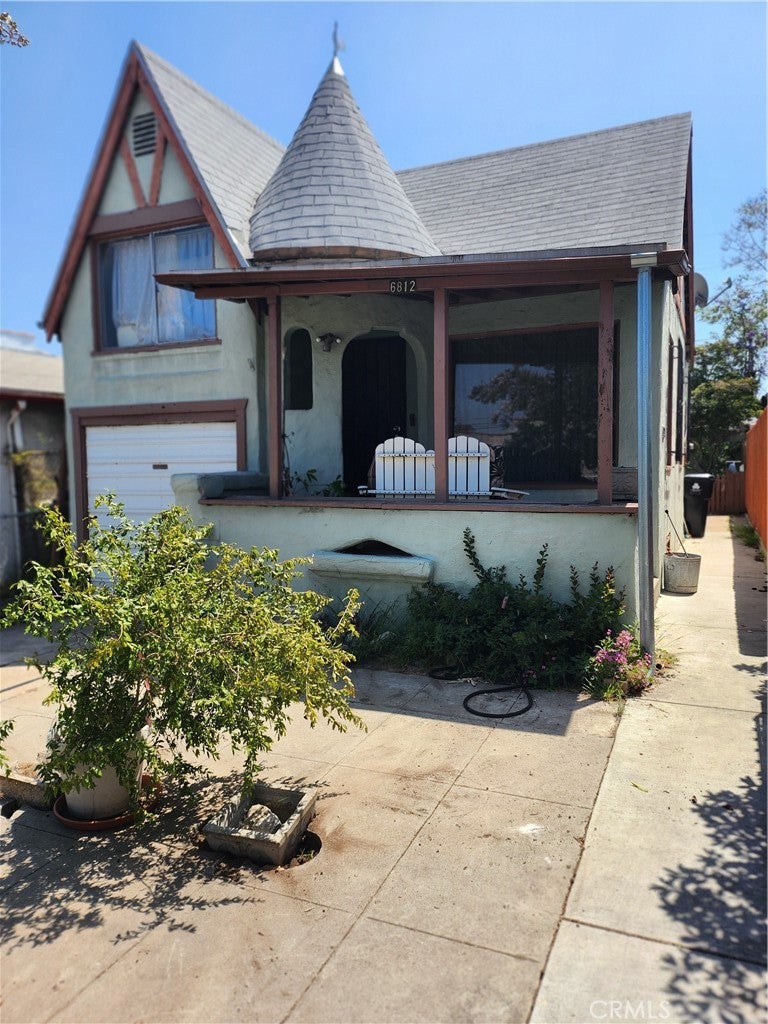 Photo of 6812 S Van Ness AVE, Los Angeles, CA 90047 (MLS # RS26179277)