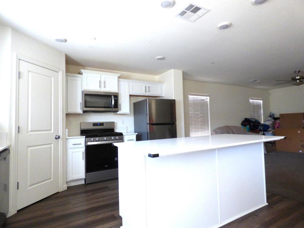 Welcome to this beautifully maintained 2-year-old home located in a quiet and desirable Madera neighborhood. Perfect for first-time buyers or those looking to upgrade, this modern residence offers the ideal blend of contemporary design, comfort, and energy efficiency. With 1,862 square feet of thoughtfully designed living space, the home features four spacious bedrooms and three full bathrooms. The open-concept layout is filled with natural light and includes a stylish kitchen with granite countertops and stainless steel appliances, seamlessly connecting to a comfortable family living roomperfect for both relaxing and entertaining. The primary suite includes a walk-in closet and a luxurious en-suite bathroom for your comfort and privacy. Designed with sustainability in mind, the home is equipped with solar panels, energy-efficient windows, and a smart thermostat to help reduce utility costs. An attached garage provides ample storage space. Conveniently located near schools, parks, and shopping, this move-in ready home is a true gem in the heart of Madera.