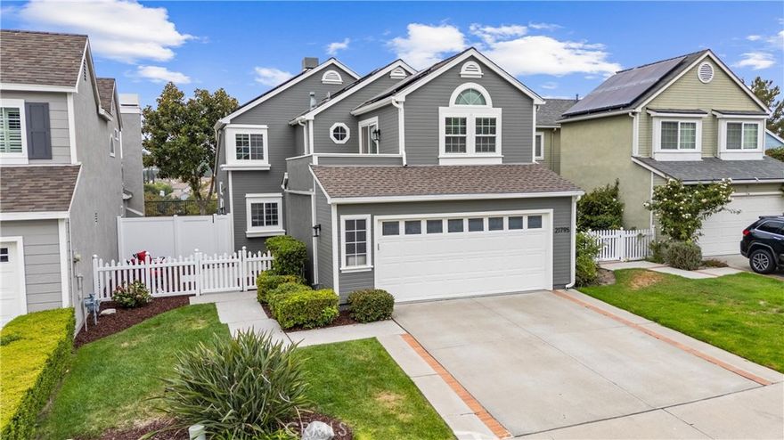 Welcome to your dream Cape Cod style retreat in the highly desirable Evergreen Lakeview community. Perfectly situated on the view side of a quiet cul-de-sac, this turnkey 3-bedroom, 2.5-bath home offers elegant coastal-inspired living with breathtaking panoramic views and extensive high-end upgrades throughout. Step inside to a light-filled, open-concept layout, anchored by a reimagined dual-sided fireplace that adds charm and warmth to both the family room and dining area. The deluxe gourmet kitchen has been completely remodeled with premium finishes, perfect for everyday living. The expansive primary suite is a true retreat, featuring a private sundeck where you can unwind and take in stunning views. The two additional bedrooms share a beautifully renovated bathroom with designer touches.  The spacious and private backyard is ideal for outdoor living, featuring a new covered patio with built-in lighting—perfect for dining al fresco or hosting gatherings. And on the 4th of July, enjoy a front-row seat to the Lake Mission Viejo fireworks show—right from your own backyard.  Home upgrades are too vast to list, please check the listing supplements for a full list of upgrades.  Highlights include entire kitchen remodel, newer flooring throughout, full renovation of both the primary and secondary upstairs bathrooms, upgraded lower level bathroom, interior and exterior paint, updated lightning with dimmers, updated door hardware, water softener, back patio cover with lighting, yard fencing both vinyl and wrought iron, updated electrical box, two garage EV charger plugs, and a solar PPA  system.  Low HOA, Lake Mission Viejo membership with full amenities, and NO Mello-Roos—this home perfectly captures the essence of Southern California living.  Don’t miss this rare opportunity to own a truly special home in one of Mission Viejo’s most coveted neighborhoods.  Come experience the lifestyle of your dreams.