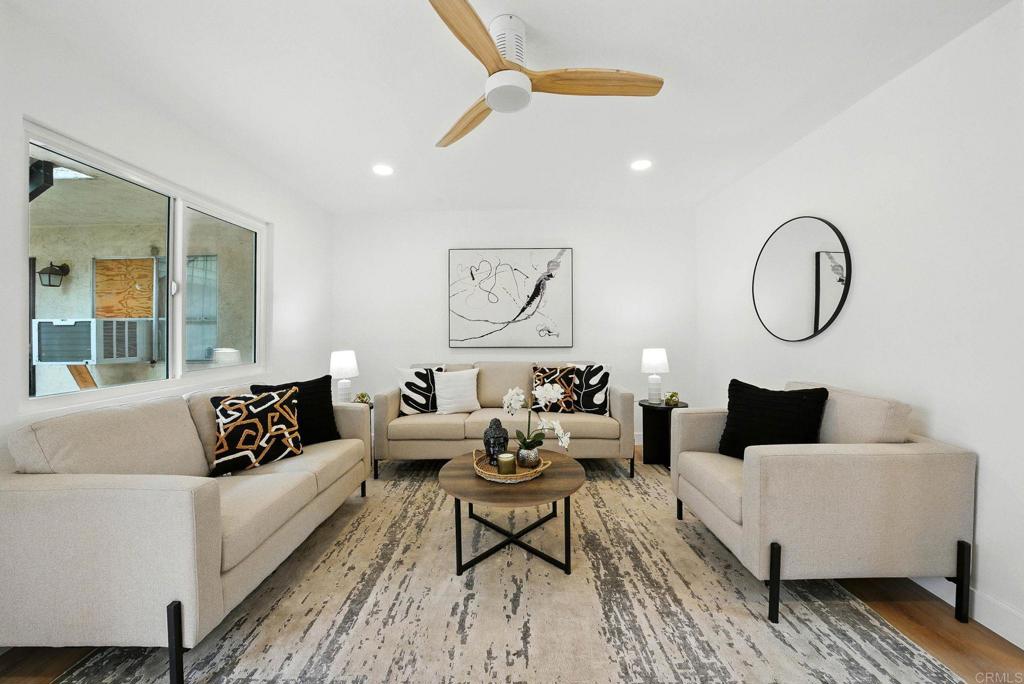 Updated, Affordable, and Centrally Located—Your San Diego Starter Home Awaits! Why rent when you can own this bright, modern, and move-in-ready 1-bedroom, 1-bath condo in the heart of San Diego? Located on the ground floor of a gated community, this freshly updated unit features brand-new flooring, fresh designer paint, and an open space that maximizes space and natural light. The kitchen includes sleek cabinetry, a electric range, and built-in microwave—making home-cooked meals a breeze. Enjoy the simplicity and value of low HOA dues, assigned off-street parking, and secure gated access. This is a perfect fit for a first-time buyer, student, or investor looking for a low-maintenance property in a high-demand rental area. Just minutes to SDSU, North Park, Downtown, and major freeways, this location offers unmatched access to transit, shopping, dining, and more. Skip the bidding wars—this is one of the best values in metro San Diego. Start building equity today in this stylish, budget-friendly condo!
