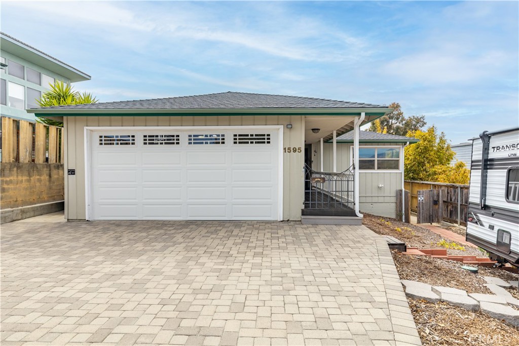 Welcome home to this Coastal Gem! Located in the seaside community of Los Osos, this warm and inviting, meticulously maintained 3 bedroom 2 bath home, sits on a large 6250 Sq Ft lot. Features include a new roof, newer garage door, concrete paver driveway, solar panels, gorgeous wood and tile floors, Anderson french doors, upgraded windows throughout, granite kitchen countertops, double ovens, remodeled baths, and a cozy living room complete with fireplace and a framed view of Hollister Peak. Relax on one of the outdoor decks and enjoy your own "secret garden" where lush landscaping abounds!
Adjacent to the main living areas through a private side entrance, you'll find a charming studio apartment that was converted from the home's original primary ensuite bedroom. Added touches include a double sink vanity, new quartz countertop and fixtures, custom tile shower, and large walk-in closet. The space features a clever kitchenette built-in wall unit, hard surface floors, and double French doors that lead out to a designated deck and garden area, perfect as a private retreat for guests, a tenant or for use as a quiet home office. The studio could also be converted back to a primary suite/third bedroom that would expand the main home and extend the wrap-around outdoor living areas.
This delightful home is move-in ready and is within close proximity to local beaches, numerous hiking trails, and the pristine Estero Bay.