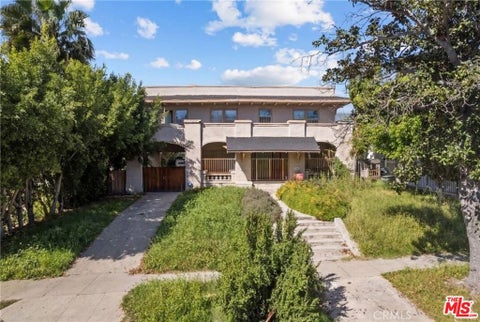 Photo of 1021 S Gramercy Place, Los Angeles, CA 90019 (MLS # 26992515)