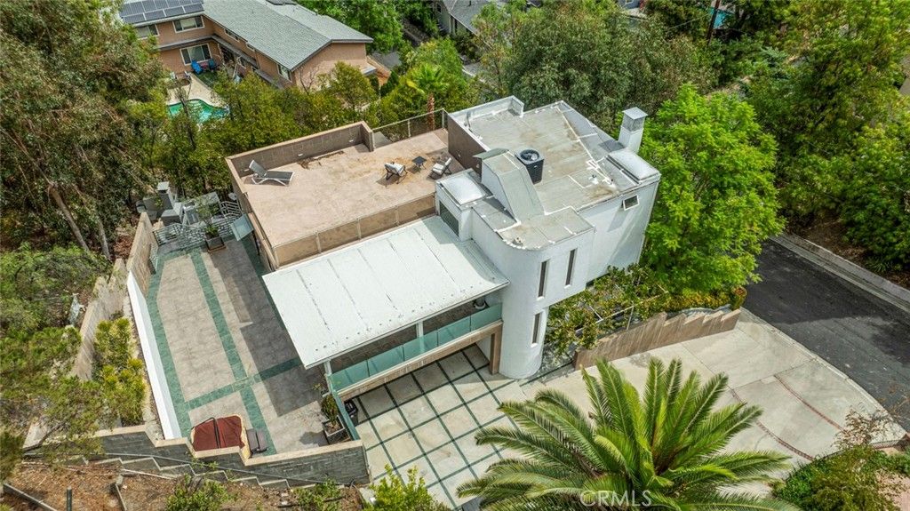 Photo of 22619 Holanda Road, Woodland Hills, CA 91364 (MLS # BB25200707)