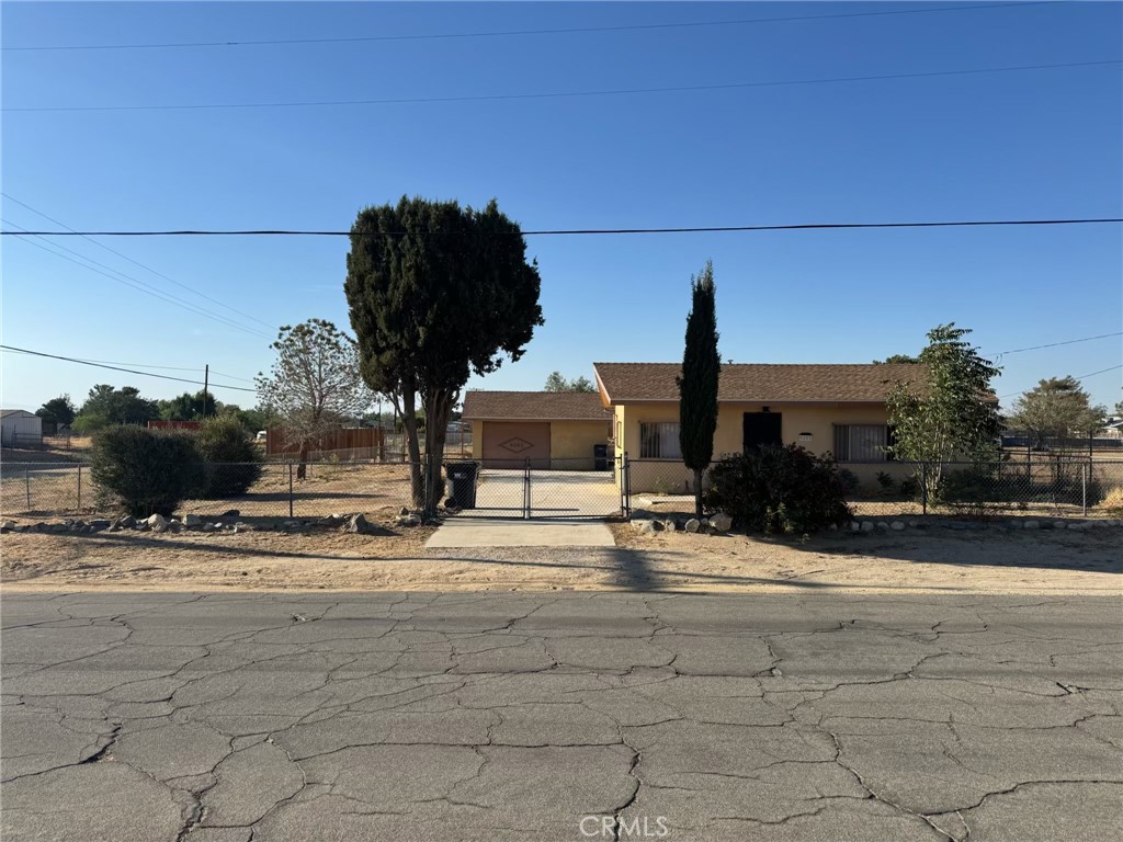 Amazing opportunity - Corner lot location with almost an acre of land that is ready for expansion of current 1 bedroom 1 bathroom Home. Property already has updated bathroom, New septic tank, New laminate flooring, Newer Roof. 2 car detached garage.