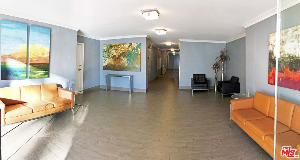 Spacious, remodeled 1 bed / 1.5 bath south-facing unit on the 5th floor with city views, right in the heart of Beverly Hills. Open floor plan with abundant natural light. Generously sized bedroom and closets, plus more closets in the hallway and a separate dressing area. Updated bathroom with tub and shower, plus a powder room. Exceptionally well-maintained building with manicured landscaping, security cameras throughout, and spotless laundry rooms on every floor. Prime location near Roxbury Park with access to tennis, basketball, BBQ areas, baseball, volleyball, and more. Walk Score of 80, minutes to world-class shopping and dining in Beverly Hills and Century City.