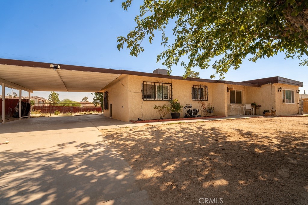Great opportunity in the city of Victorville. This home sits on a 12,000 sqft lot the main house has 4 bedrooms, two full bathrooms, and upgraded kitchen. The master bedroom opens to a retreat that can be used as a seating area or TV room. The property includes an ADU with one bedroom, bathroom, kitchen, laundry room and family room. It also has easy access to the 15FWY. Buyer and buyers agent to verify all information and do their due diligence.