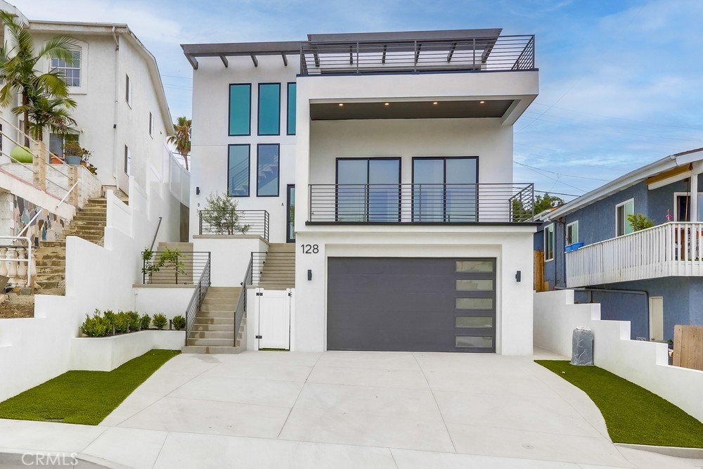 Be the first to live in this brand new home. Just finished in August 2025, this home with modern architectural has all the upgraded finishings. Enjoy your private elevator from the garage to the kitchen and main living area on the 3rd floor. Not only is there almost 2700 square feet of living area, there is over 1300 sf of outdoor balcony space in 3 separate balconies. The largest patio is off the main living area and is a great location for outdoor entertaining. Gas BBQ is included and the space is designed for an outdoor TV, outdoor dining and still plenty of room for a large outdoor couch. House comes with WiFi already installed with an EERO mesh network to ensure connectivity anywhere in the home. The kitchen is large with an island and plenty of prep space. There are two sinks in the kitchen in addition to a side area with a wet bar. Total of 4 bedrooms with 3.5 bathrooms with laundry room and all appliances are included. Home is less than a mile to the ocean, but still has central air conditioning for those 2 days a year it gets hot. Property also has solar installed so it should cover most of electricity bill.