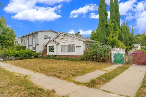Photo of 5816 Woodman Ave AVE, Van Nuys, CA 91401 (MLS # SB26141150)