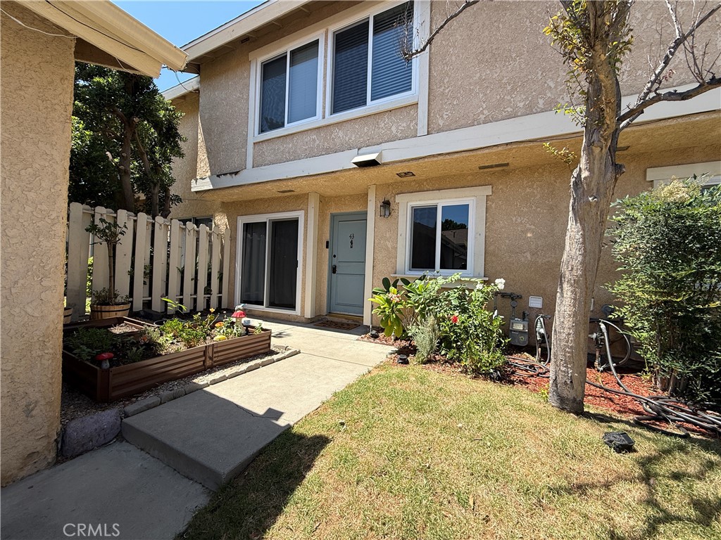 Move-in ready townhome in the heart of Chatsworth! This updated 3-bedroom, 1 1/2-bathroom townhome offers 1,283 sq ft of light-filled living space with modern upgrades and a thoughtful layout. Step into a spacious living room with new flooring, lighting, and large new windows that bring in tons of natural light. The separate dining area overlooks the living space and connects to a bright kitchen with ample cabinet space. Upstairs, you’ll find three bedrooms, including a primary suite with a jacuzzi tub. Additional updates include NEW HVAC unit. The home also features a detached 1-car garage plus an assigned parking space. Enjoy both a finished front and back yard, perfect for outdoor entertaining, gardening, or just relaxing in your own private space. Close to shopping, dining, schools, parks, and the 118 freeway. A perfect blend of style, comfort, and convenience—don’t miss this Chatsworth gem!