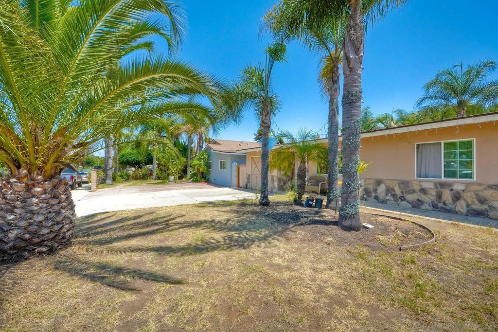 This Escondido home is full of charm and potential. This home sits on a spacious lot framed by mature palm trees and features ample off-street parking, a rare convenience so close to the heart of the city. Inside, you'll find natural light pouring into the living area and classic touches throughout. The kitchen offers vintage cabinetry, and a cozy dining nook perfect for morning coffee or casual dinners. Both bedrooms are generously sized with plenty of closet space, and the bathroom features timeless tile work. A bonus room adds flexibility for a home office or guest space, while the attached garage and additional storage areas provide plenty of room for your tools. Step outside to enjoy a private patio area ideal for relaxing, entertaining, or cultivating your own garden oasis. Located just minutes from Downtown Escondido, this home offers easy access to a vibrant mix of cafés, boutiques, parks, and local entertainment. A fantastic opportunity for first-time buyers, small families, or anyone looking for charm, location, and flexibility. This Escondido gem is ready to welcome you home! Both bedrooms are generously sized with plenty of closet space, and the bathroom features timeless tile work. A bonus room adds flexibility for a home office or guest space, while the attached garage and additional storage areas provide plenty of room for your tools. Step outside to enjoy a private patio area ideal for relaxing, entertaining, or cultivating your own garden oasis. Located just minutes from Downtown Escondido, this home offers easy access to a vibrant mix of cafés, boutiques, parks, and local entertainment. A fantastic opportunity for first-time buyers, small families, or anyone looking for charm, location, and flexibility. This Escondido gem is ready to welcome you home!