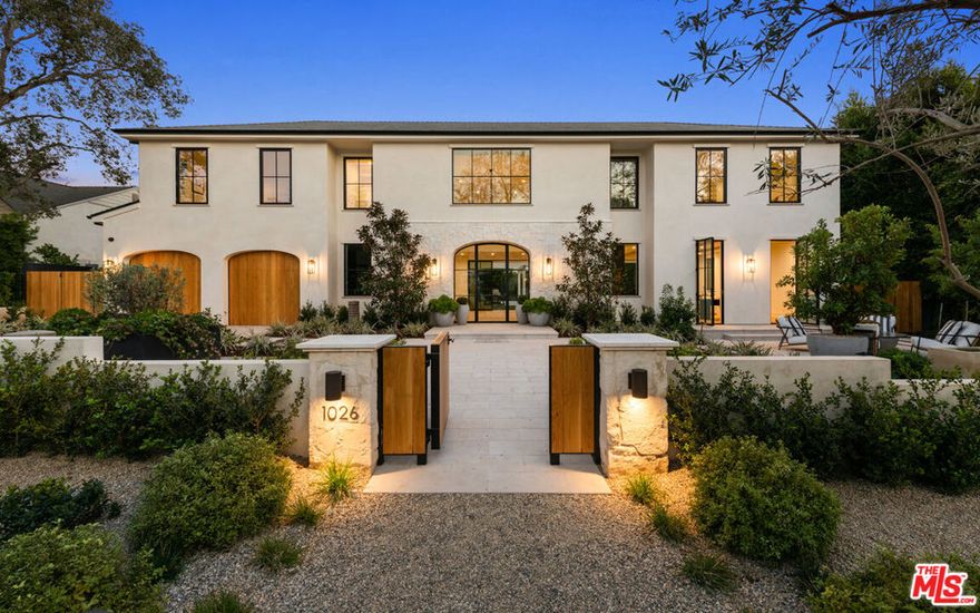 Prime Riviera Masterpiece. Rich with timeless sophistication and modern materials, experience a profound sense of space with the open floor plan of the Corsica Home. Be welcomed by the vaulted entryway that sets the tone for a luxurious atmosphere that harbors sophistication with relaxation and play. Boasting clean lines throughout, this stunning 5 bedroom 9 bath home perfectly blends the old world charm with today's modern conveniences. The open concept of the family room, dining room, and lounge area is ideal for daily family and entertaining. With floor-to-ceiling windows, the space lends itself to a seamless connection of the outdoor alfresco dining area, fire pit, outdoor kitchen, large yard, fountain, and pool. A spacious, gourmet chef's kitchen features an ILVE freestanding range and a Sub-Zero refrigerator/freezer with Calacatta stone countertops that rest on top of European white-oak cabinetry. The Corsica home boasts an immense amount of impeccable amenities such as a secluded home theater, game room, wet bar, elevator, and more. The primary bedroom has dual baths and closets, oversized windows, and a fireplace for romantic evenings. Meer minutes from the breathtaking Californian coastline and surrounding amenities including world-class dining in the Palisades Village and Montana Avenue, this one-of-a-kind home is an absolute must-see.