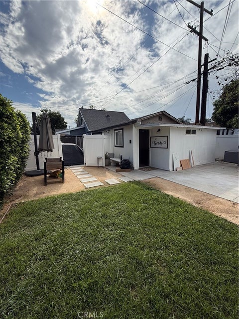 Photo of 618 S Sycamore Street, Santa Ana, CA 92701 (MLS # PW26232063)