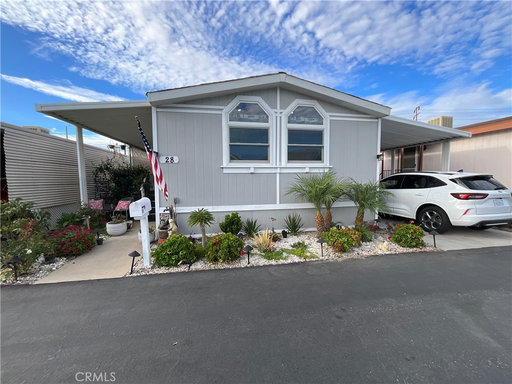 You will not want to miss this one!! well maintained home in The Driftwood Park Senior Community. Beautiful Kitchen with elegant quartz countertop, white cabinets and an open floor. Bathrooms in a great condition with Marble countertops and glazed white showers. Two nice size bedrooms with lots of closet space. Carport can accommodate two cars plus a shed. Park amenities include a heated pool, clubhouse, 2 car washing areas, shuffleboard court, billiard room and a dog park. Located close to shopping , dining, and freeways