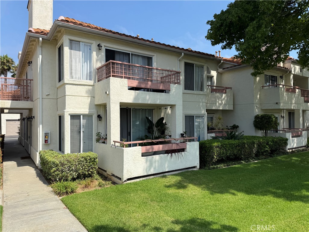 This light-filled 2-bedroom, 2-bath condo combines modern upgrades with unbeatable amenities. Enjoy brand-new floors throughout and a remodeled master bathroom designed with comfort and style in mind. The open floor plan features a spacious living area, a well-appointed kitchen, and the convenience of in-unit washer and dryer. One of the few condos in the community with a private attached garage, this home offers both security and direct access. The well-maintained complex includes a sparkling swimming pool, tennis courts, a clubhouse for gatherings, and a fully equipped fitness center—perfect for an active and social lifestyle. Move-in ready and ideally located, this condo is the perfect blend of comfort, convenience, and community.