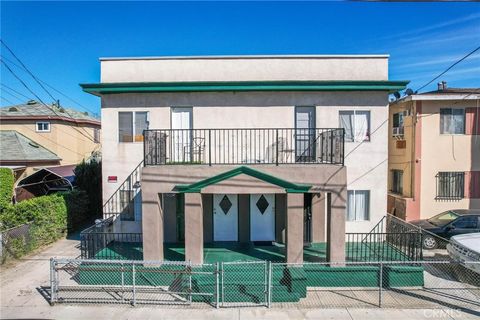 Photo of 1758 S New England Street, Los Angeles, CA 90006 (MLS # SR26048035)