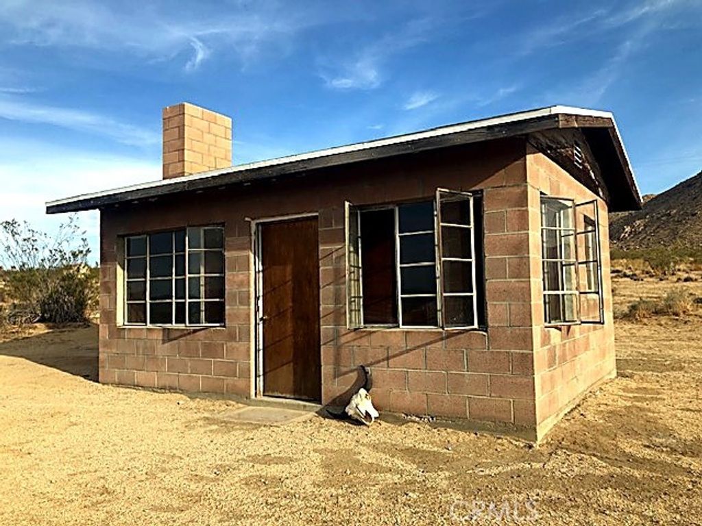 Photo of 51050 Cholla Rd, Johnson Valley, CA 92285 (MLS # JT26055826)