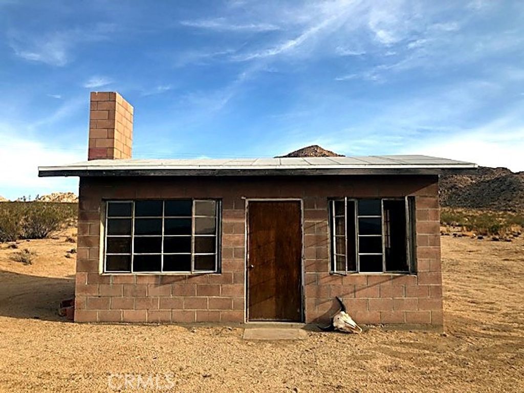 Photo of 51050 Cholla Rd, Johnson Valley, CA 92285 (MLS # JT26055826)