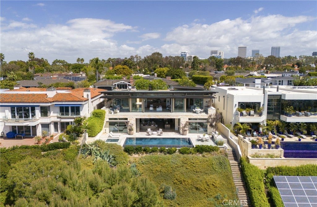Photo of 1231 Dolphin Ter, Corona Del Mar, CA 92625 (MLS # NP26047341)