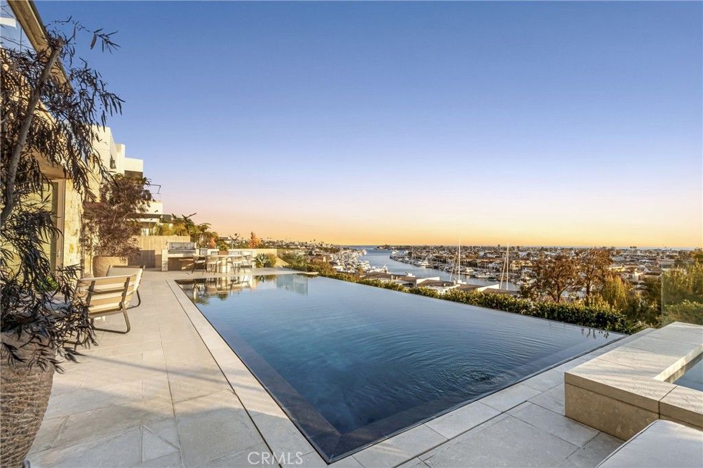 Photo of 1231 Dolphin Ter, Corona Del Mar, CA 92625 (MLS # NP26047341)