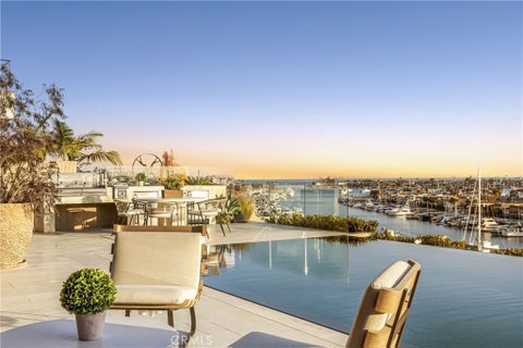 Photo of 1231 Dolphin Ter, Corona Del Mar, CA 92625 (MLS # NP26047341)