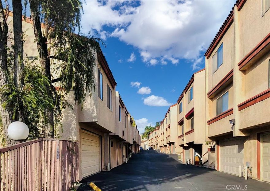 Welcome to this bright and inviting 3-bedroom, 2-bath end-unit townhouse perfectly situated in one of Monterey Park’s most desirable neighborhoods. This thoughtfully designed layout features a spacious primary suite on the first floor, offering added privacy away from the main living areas—perfect for multigenerational living, guests, or anyone who prefers easy ground-level access.

Upstairs, natural light pours in through large windows and newer skylights, illuminating the open and airy living room, dining area, and kitchen. The second floor also includes two bedrooms, a full bathroom, and access to a lovely balcony through the living room—a perfect spot to enjoy your morning coffee or unwind at sunset.

The home has been thoughtfully maintained over the years with numerous updates for comfort and peace of mind. A new HVAC system installed in 2017 still operates like new, ensuring year-round climate control. A new skylight was replaced in 2019. New flooring was added in 2020, followed by a serviced electrical panel in 2021. In 2024, the property received several major improvements, including roof repairs, new rain gutters, a new garage door, and a new garbage disposal. To complete the refreshed look, the interior has been recently repainted. The attached 2-car garage provides direct access to the home and convenient in-garage laundry.

Located in a prime and highly convenient area, this home sits between the 10 and 60 freeways, making commutes to Downtown Los Angeles, Pasadena, Alhambra, and surrounding cities a breeze. You’re just minutes from an array of amenities, including popular malls, local shops, supermarkets, diverse restaurants, movie theaters, multiple parks, scenic hiking trails, and award-winning schools. For everyday convenience, the public library and City Hall are close by as well.

With its desirable layout, modern upgrades, abundant natural light, and unbeatable location, this Monterey Park end-unit townhome is a rare opportunity you won’t want to miss.