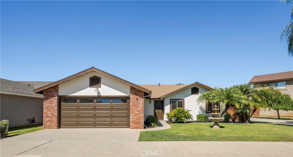 Welcome to your newly upgraded sanctuary in the serene community of Azusa, tucked away on a quiet cul-de-sac. This contemporary single-story home has a freshly painted exterior and blends style and functionality with its recent renovations. The remodeled kitchen is a culinary masterpiece, featuring sleek quartz countertops, freshly painted two-toned cabinetry, and custom floating shelves. The kitchen, living room & bathrooms all have new luxury plank vinyl flooring, while the bedrooms offers the soft comfort of new plush carpeting. All 2.5 bathrooms have been stylishly refreshed, complete with updated vanities, quartz countertops, and durable vinyl floors. Fresh paint throughout the home creates a cohesive atmosphere of elegance and comfort. Upon entering, the spacious family room and formal dining area invite you to host gatherings and create lasting memories. The expansive kitchen flows into a cozy breakfast nook, the perfect heart of the home. Outside, enjoy a beautifully landscaped backyard with fresh sod and a spacious patio, ideal for outdoor entertaining or quiet relaxation. This thoughtfully designed home combines modern aesthetics with undeniable charm, offering you the perfect balance of comfort and elegance. Your new haven in Azusa is ready to welcome you home.