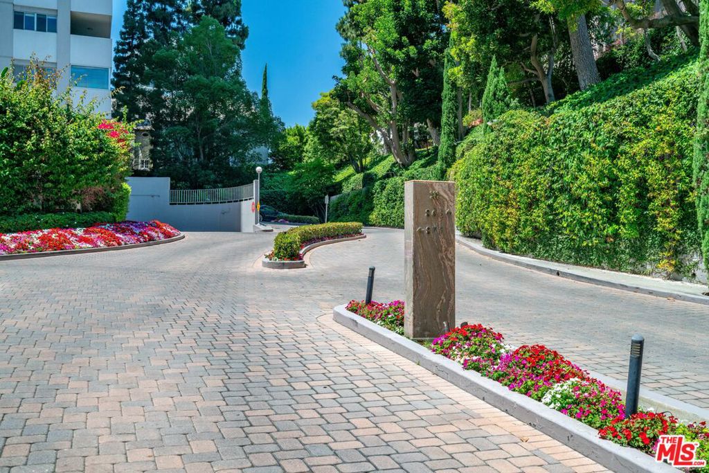 Elegant High-Rise Living at The Comstock, Set high on the 7th floor and tucked away from Wilshire for peaceful living, this two-bedroom, two-bath residence at The Comstock offers sweeping views of Holmby Hills, Bel-Air, and the Los Angeles Country Club.The desirable split floor plan features a spacious living and dining area, modern kitchen, designer flooring, custom built-ins, and in-unit laundry. Expansive windows showcase the breathtaking vistas while creating a serene retreat above the city.Residents enjoy premier full-service amenities including 24-hour valet, doorman, concierge, pool, spa, and sauna all just moments from Beverly Hills and Century City.Welcome home to panoramic views, tranquility, and timeless elegance at The Comstock. Buyer to cooperate with seller on a 1031 exchange, at no cost to the buyer.
