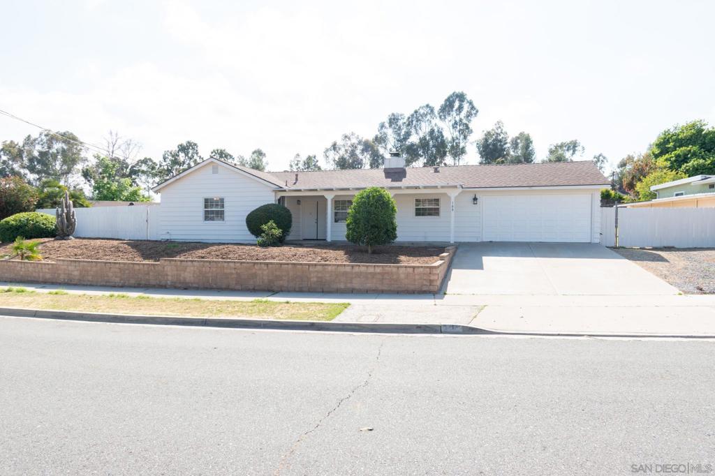 3 Bedroom, 2 Bath home with 2 car garage in the Fletcher Hills area near San Carlos and Grossmont. Large lot that's approx 1/4 acre with room in the backyard for an ADU. Wide side gate to the backyard large enough for a RV or boat. Central heat and air conditioning. Vinyl windows throughout and new vinyl sliding door. Freshly painted with vinyl wood planks in the kitchen/living room and newer carpet in the bedrooms. Kitchen has a newer dishwasher and refrigerator. Living room includes a fireplace and a sliding door to a covered patio. Breakfast area next to kitchen. Hallway bathroom previously remodeled. Laundry, storage cabinets and automatic door opener in the 2 car garage. Large shed in the backyard for storage. Large front yard area with fruit trees and plenty of space for more. Beautiful La Mesita park located down the street, which has open grass areas, new playground, tennis/pickleball courts, skatepark and more.