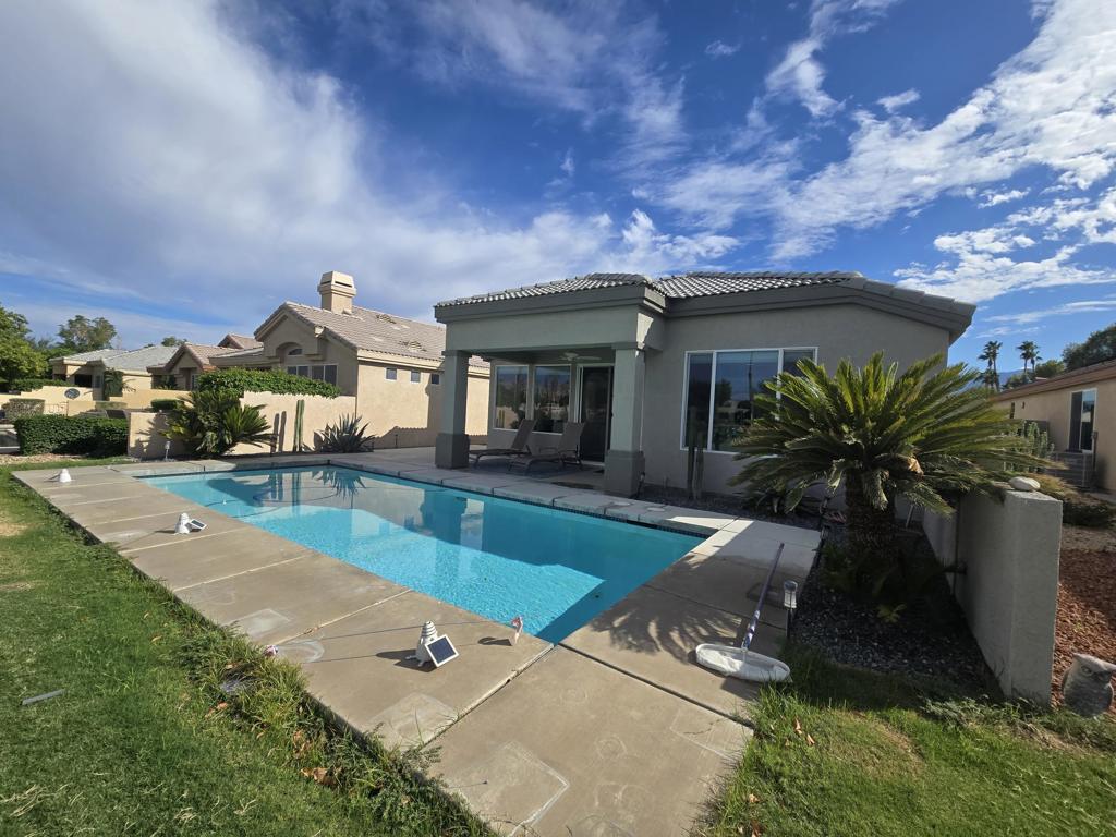 Discover the exquisite charm of this remodeled villa with private pool, where luxury meets comfort in every detail. This stunning residence boasts two spacious bedrooms, a versatile den that can serve as a third bedroom, and an additional bonus room. This home is perfect for entertaining or unwinding at the end of the day. Enjoy the elegance of beautiful gray tile flooring throughout, complemented by numerous upgrades and meticulously designed landscaping. Picture yourself lounging by your private pool, soaking in the serene views, and watching the golfers on Cielo 8. The garage is not just functional, but a stylish space with ample cabinets and an epoxy floor. This is more than just a home; it's a lifestyle of relaxation and enjoyment waiting for you inside the Desert Princess Country Club.Land Lease thru 2069 - Monthly Ground Rent is $114.29.HOA DUES INCLUDE: 2 DVR or HD Cable boxes and service, High Speed Internet, grounds maintained to your door by HOA ground maintenance crew, outside pest control when requested, outside water, (you pay only for inside water). Gated community with 24 hour guard gate access, membership to Health and Fitness Center, Tennis, Bocce Ball, Pickleball. Discounts and preferred tee-times for owners at the Desert Princess 27-hole PGA Championship golf course, no initiation fees, rated among the best in the valley by GOLF DIGEST. This quiet community is away from the noise yet minutes from everything that is in Palm Springs; restaurants, shopping, casinos, an international airport, the Tramway, Art Museum, Theaters, and the Street Fair.