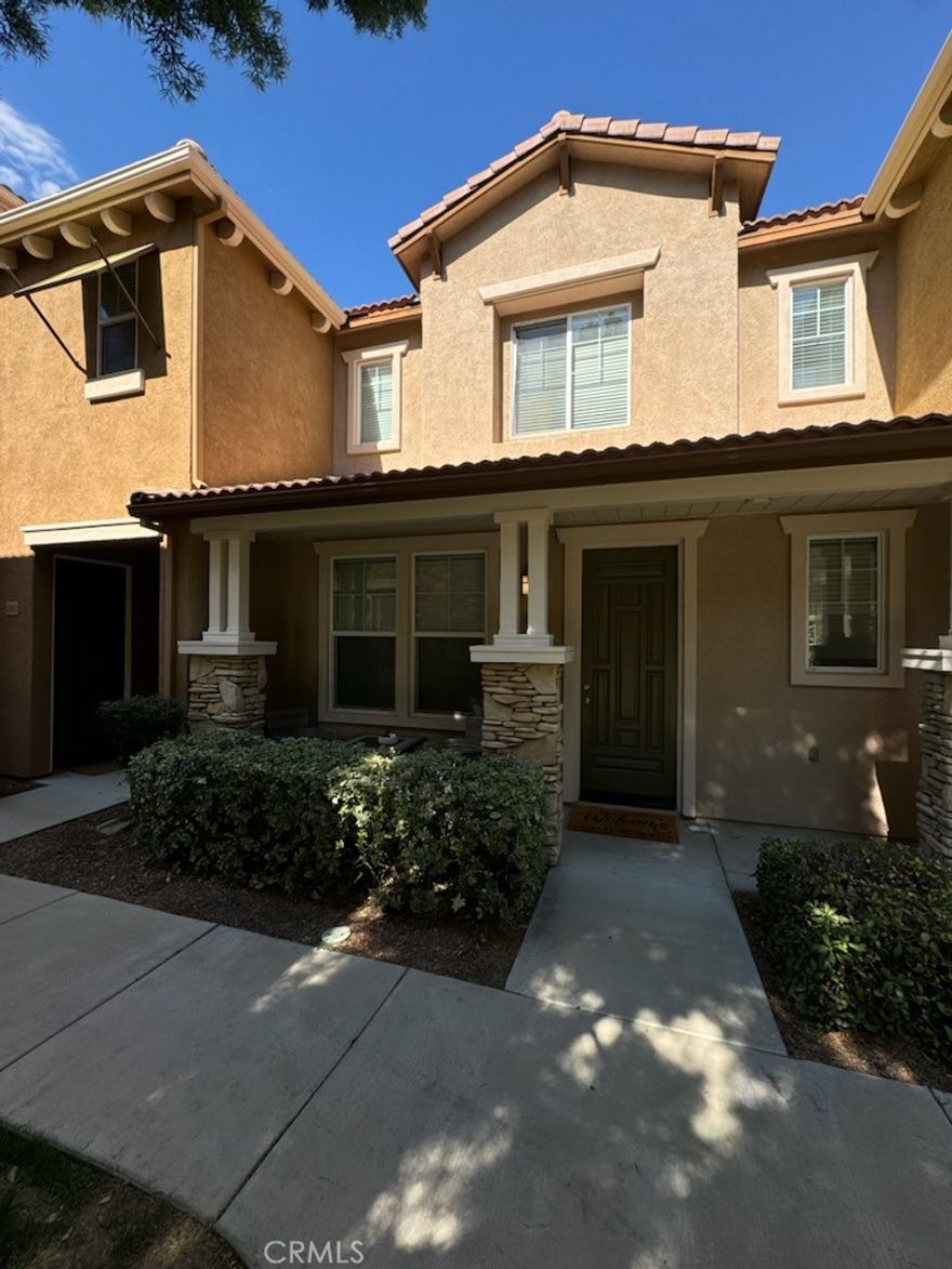 Beautiful 2 Bedroom, 3 Bath Condo in  Canyon Hills! Welcome to this charming condo located in the highly sought-after gated community of Canyon Hills! This home combines comfort, convenience, and community amenities in one perfect package. Inviting front porch ideal for morning coffee or relaxing in the evening. Interior Features: Spacious family room with a cozy fireplace, built-in media niche, and an open-concept layout. Large kitchen offering a breakfast bar for extra seating, solid surface countertops, abundant cabinetry, stainless steel appliances, and a gas cooktop—flowing seamlessly into the dining area and family room. Convenient main-level half bath with pedestal sink.  Bedrooms & Upstairs Living: Light-filled primary suite with crown molding, ceiling fan, and ensuite bath featuring a dual-sink vanity, soaking tub, separate walk-in shower, and walk-in closet. Secondary bedroom is generously sized and served by a full bath with tub/shower combo. Built-in desk area upstairs—perfect for working from home or study space. Laundry room with built-in cabinets for added storage and convenience.  Community & Location: Enjoy resort-style amenities including a pool, clubhouse, multiple parks, and family activities. Walking distance to restaurants, shopping, elementary and middle schools. This home offers the perfect balance of comfort and convenience in a desirable neighborhood.