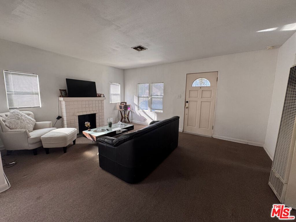 Photo of 6710 4th Avenue, Los Angeles, CA 90043 (MLS # 25624523)